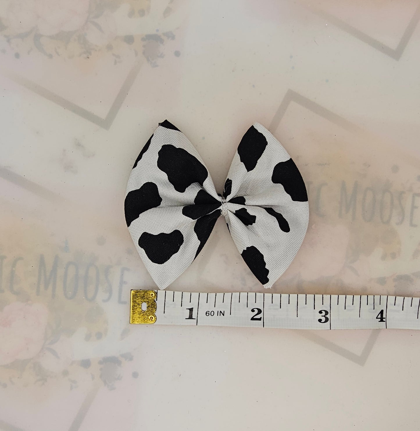 Cow print bows