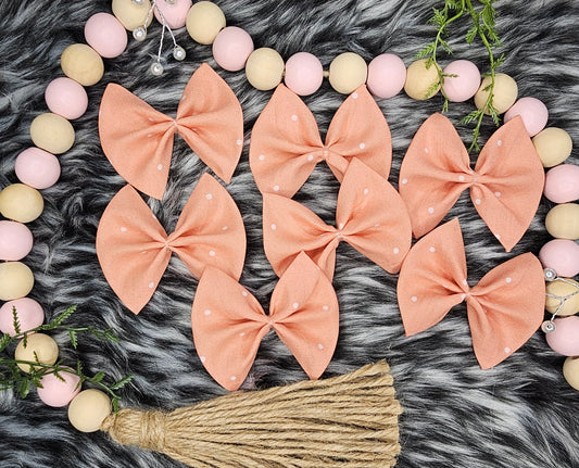 Peachy polkadot print bows