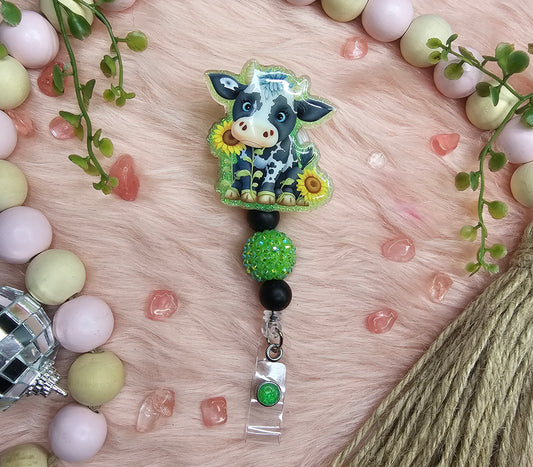 Cow with sunflowers